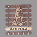 Wooden wall hook with engraved face and 'Adiyogi' branding on a white background